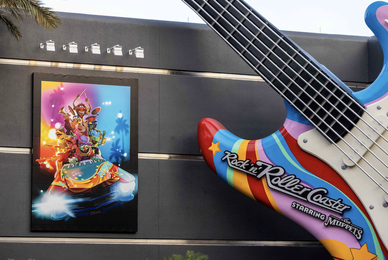 A redesigned guitar marquee for the attraction featuring The Electric Mayhem's psychedelic style.